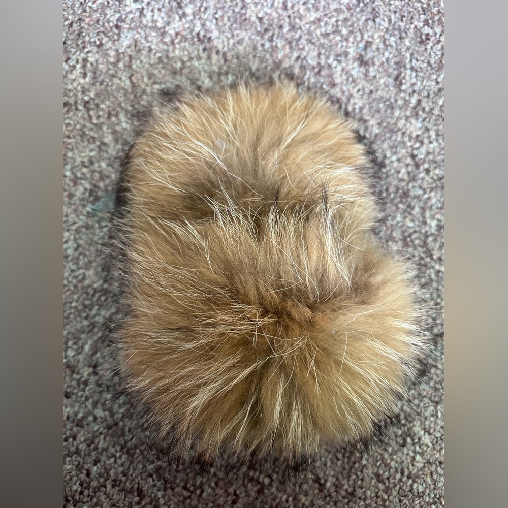Raccoon fur slippers